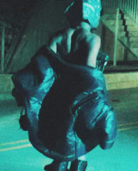 a person riding a skateboard at night
